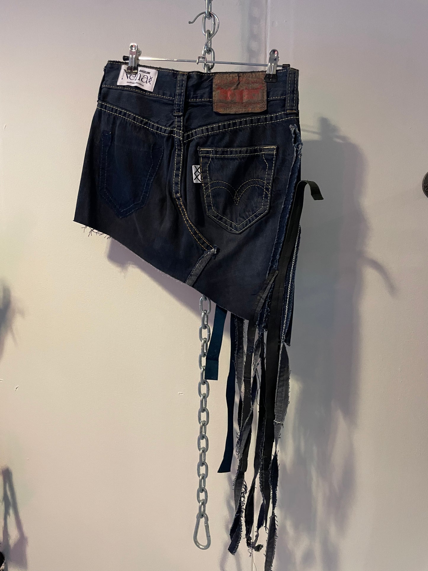 Asymetrical denim mini skirt